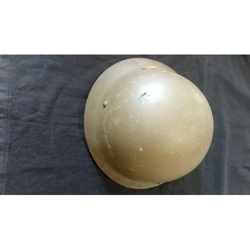 368 - WWII Imperial Japanese Army Helmet. WWII Imperial Japanese Army Helmet, original  jungle green paint... 