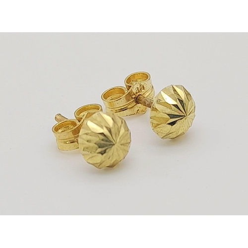 606 - Two Pairs of 9K Gold (yellow and rose) Stud Earrings. 1.05g total weight.