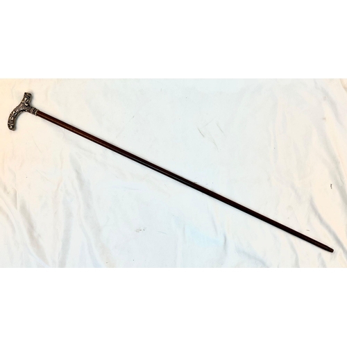 613 - An Antique Irish Fiddleback Mahogany Walking Stick with Decorative Silver Handle. 90cm total length.