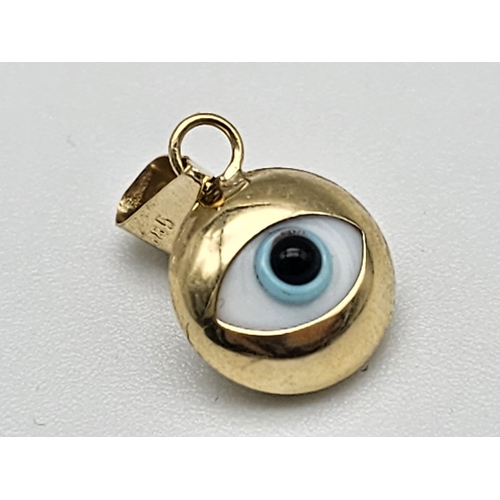 736 - 14K YELLOW GOLD EVIL EYE PENDANT. TOTAL WEIGHT 0.7G