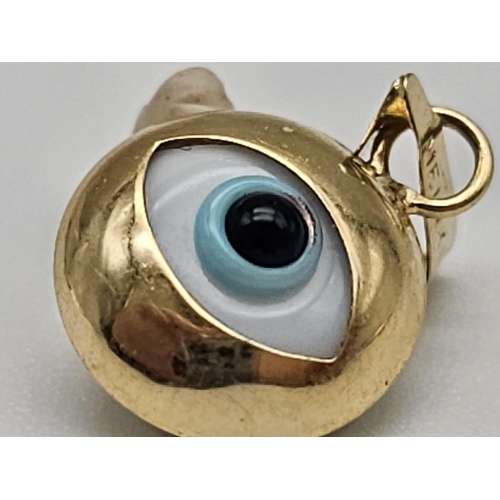 736 - 14K YELLOW GOLD EVIL EYE PENDANT. TOTAL WEIGHT 0.7G
