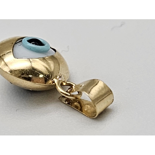 736 - 14K YELLOW GOLD EVIL EYE PENDANT. TOTAL WEIGHT 0.7G