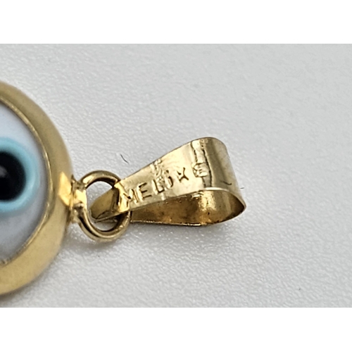 736 - 14K YELLOW GOLD EVIL EYE PENDANT. TOTAL WEIGHT 0.7G