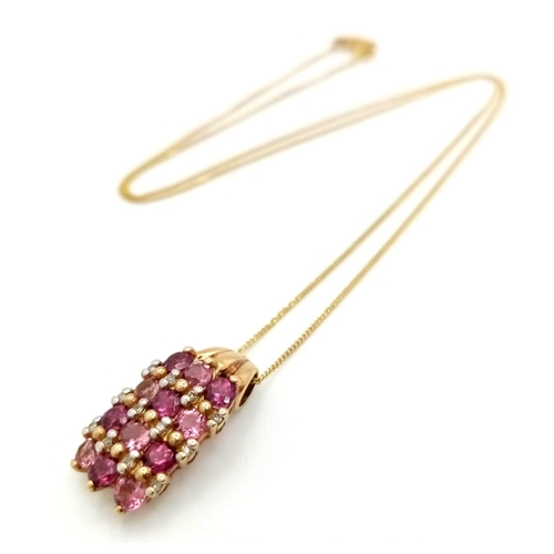 762 - A 9K GOLD AND AMETHYSR PENDANT ON A 9K GOLD DISAPPEARING 42cms NECKLACE 3gms