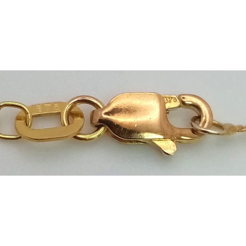 762 - A 9K GOLD AND AMETHYSR PENDANT ON A 9K GOLD DISAPPEARING 42cms NECKLACE 3gms