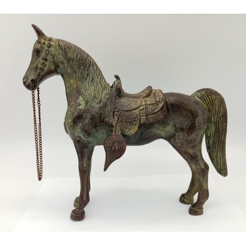 763 - A Vintage Bronze Horse Sculpture with Removable Saddle. Nice patina. 25cm tall by 28cm width.