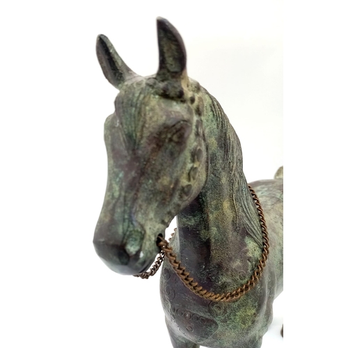 763 - A Vintage Bronze Horse Sculpture with Removable Saddle. Nice patina. 25cm tall by 28cm width.