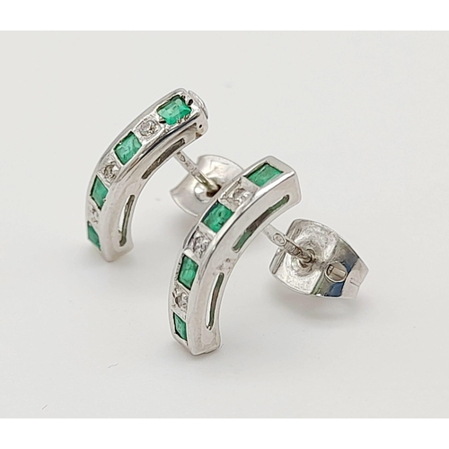 605 - A Pair of 9k White Gold Diamond Emerald Earrings. Total Weight 1.32g    8572