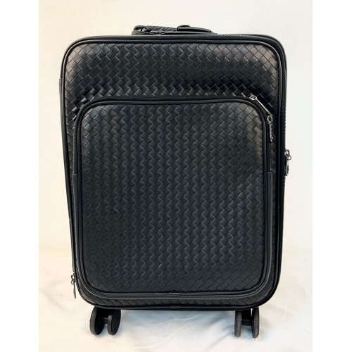 40 - A Bottega Veneta Black Intrecciato Leather Trolley Case. Large exterior pocket. Generous, deep inter... 