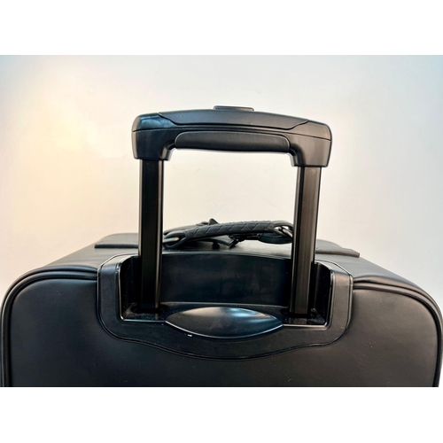 40 - A Bottega Veneta Black Intrecciato Leather Trolley Case. Large exterior pocket. Generous, deep inter... 