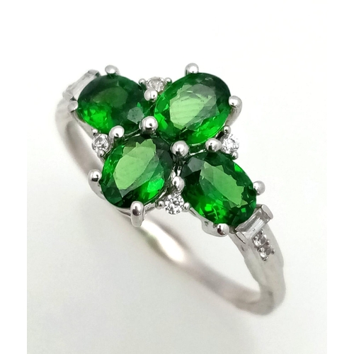 435 - A 9K White Gold Tsavorite Garnet Ring. Total Weight 2.44g. Size P.           11334