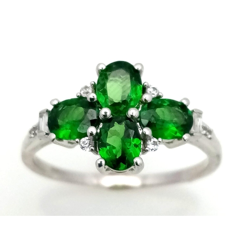 435 - A 9K White Gold Tsavorite Garnet Ring. Total Weight 2.44g. Size P.           11334