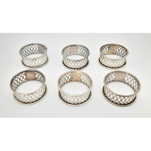 467 - A Set of Six Sterling Silver Pierced Napkin Rings. Hallamrks for Birmingham 1913. Makers mark of Geo... 