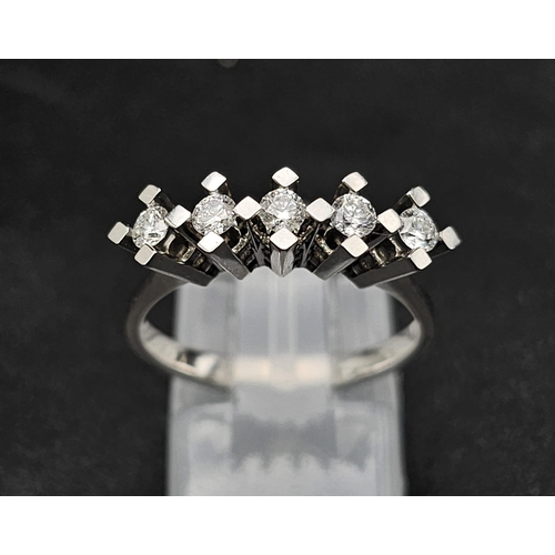 60 - A 14k White Gold 5 Stone Diamond Ring. 0.37ct Diamond. Total Weight 3.11g. Size N.     8054