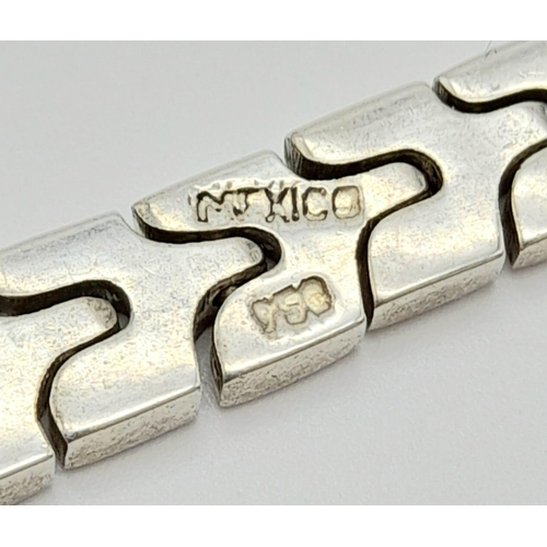 612 - A Silver Link Bracelet. Total Weight 26.38g.    11148
