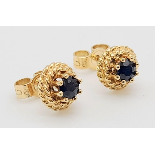633 - A Pair of 9k Gold Garnet Stud Earrings. Total Weight 1.45g    11241