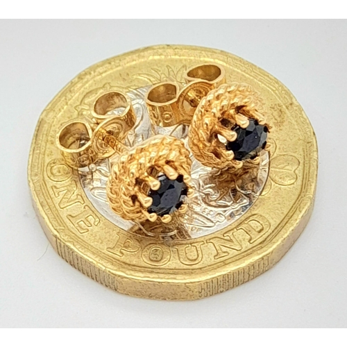 633 - A Pair of 9k Gold Garnet Stud Earrings. Total Weight 1.45g    11241