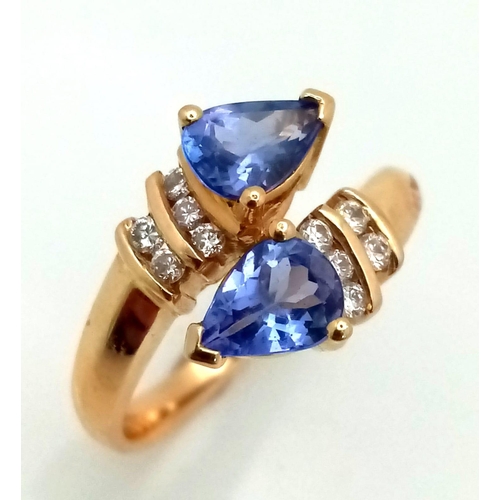 641 - A FABULOUS 14K GOLD, DIAMOND AND TANZANITE RING IN UNWORN AS NEW CONDITION .4.2gms    size N    REF ... 