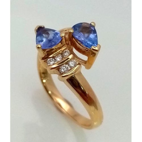 641 - A FABULOUS 14K GOLD, DIAMOND AND TANZANITE RING IN UNWORN AS NEW CONDITION .4.2gms    size N    REF ... 