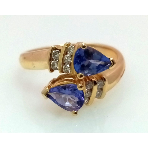 641 - A FABULOUS 14K GOLD, DIAMOND AND TANZANITE RING IN UNWORN AS NEW CONDITION .4.2gms    size N    REF ... 