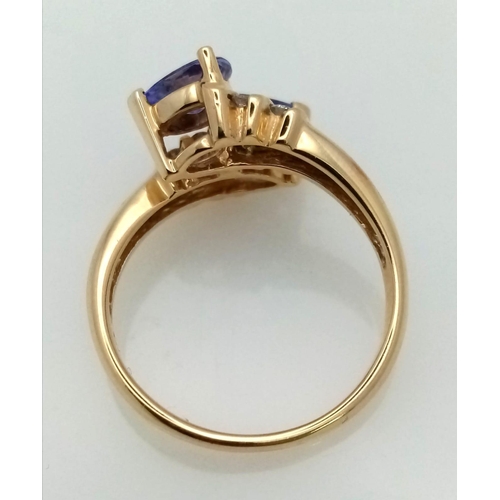 641 - A FABULOUS 14K GOLD, DIAMOND AND TANZANITE RING IN UNWORN AS NEW CONDITION .4.2gms    size N    REF ... 