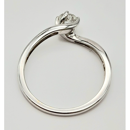 755 - AN 18K GOLD RING WITH .50ct QUALITY CENTRE STONE . 3.6gms   size R             ref 12560