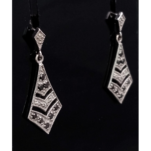 904 - A Pair of 18k White Gold Diamond Sapphire Drop Earrings. Total Weight 5.24g       5509
