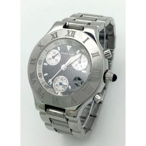 927 - A Cartier 21 Chronograph Watch. Stainless steel strap and case - 38mm. Black monogram dial with thre... 
