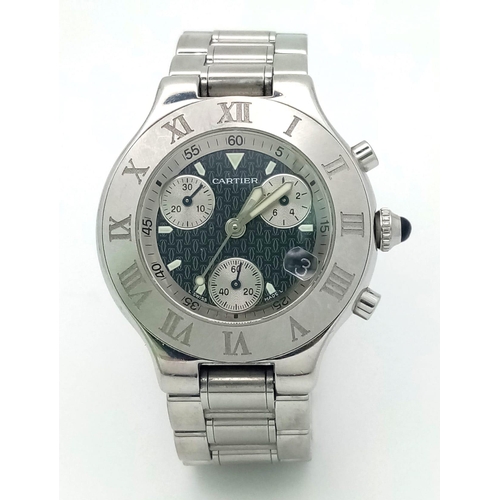 927 - A Cartier 21 Chronograph Watch. Stainless steel strap and case - 38mm. Black monogram dial with thre... 