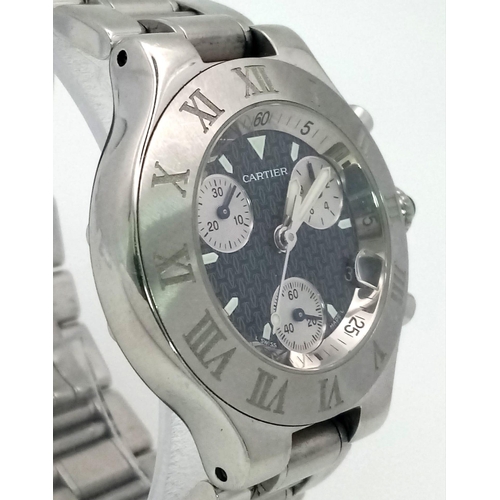 927 - A Cartier 21 Chronograph Watch. Stainless steel strap and case - 38mm. Black monogram dial with thre... 