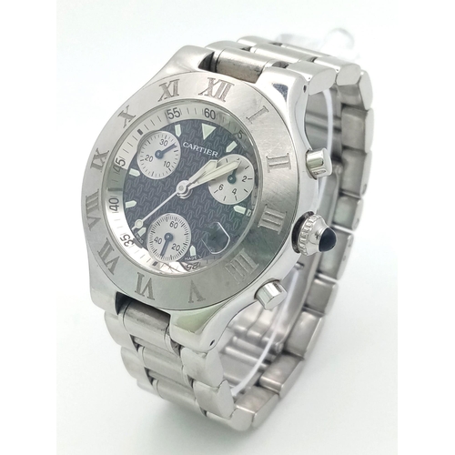 927 - A Cartier 21 Chronograph Watch. Stainless steel strap and case - 38mm. Black monogram dial with thre... 