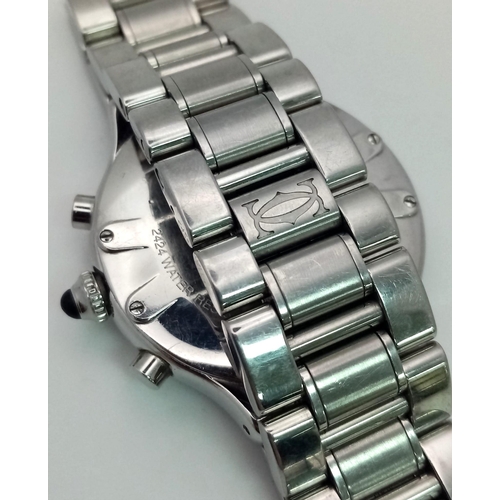 927 - A Cartier 21 Chronograph Watch. Stainless steel strap and case - 38mm. Black monogram dial with thre... 