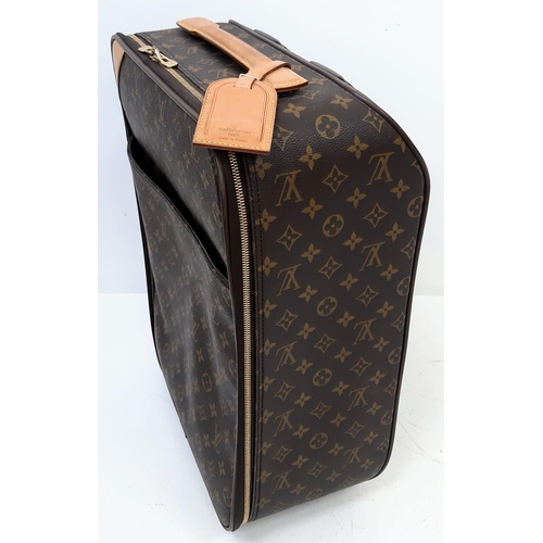 26 - A Louis Vuitton Monogram Canvas Hand Luggage Suitcase. Leather trim and handle. Large open exterior ... 