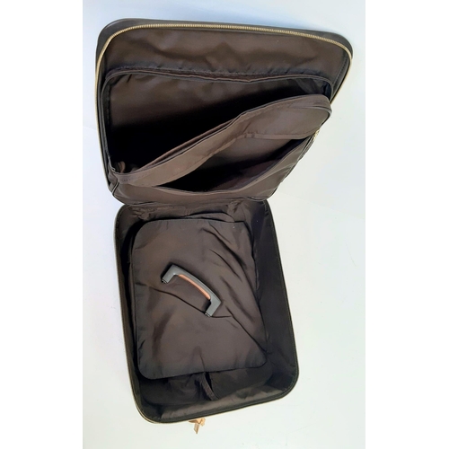 26 - A Louis Vuitton Monogram Canvas Hand Luggage Suitcase. Leather trim and handle. Large open exterior ... 