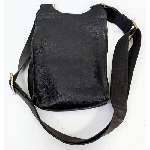 400 - A Mulberry Brown Leather Saddle Bag with Dust-Cover. Expandable shoulder strap. Gold-tone hardware. ... 