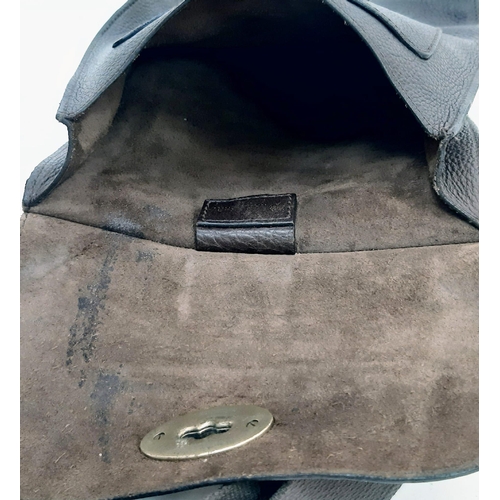 400 - A Mulberry Brown Leather Saddle Bag with Dust-Cover. Expandable shoulder strap. Gold-tone hardware. ... 