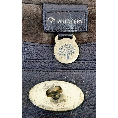 400 - A Mulberry Brown Leather Saddle Bag with Dust-Cover. Expandable shoulder strap. Gold-tone hardware. ... 