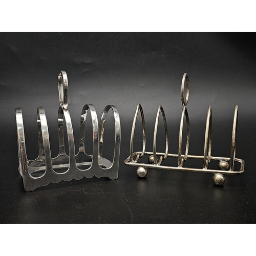 50 - Two Sterling Silver Toast Racks - Hallmarks for Sheffield 1926 and 1909. 137.5g total weight.