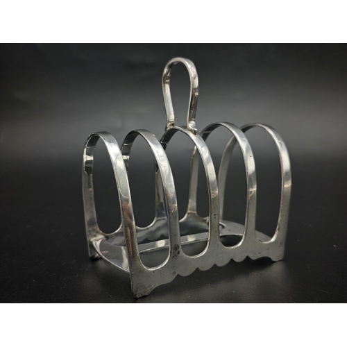 50 - Two Sterling Silver Toast Racks - Hallmarks for Sheffield 1926 and 1909. 137.5g total weight.