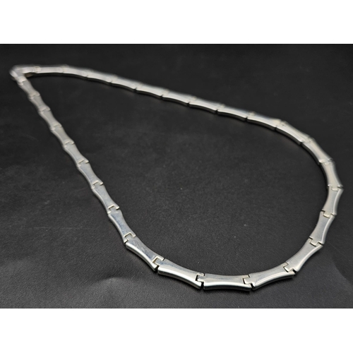 627 - AN ATTRACTIVE SILVER LINK NECKLACE .  47.2gms    42cms
