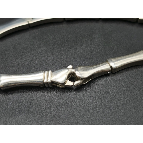 627 - AN ATTRACTIVE SILVER LINK NECKLACE .  47.2gms    42cms