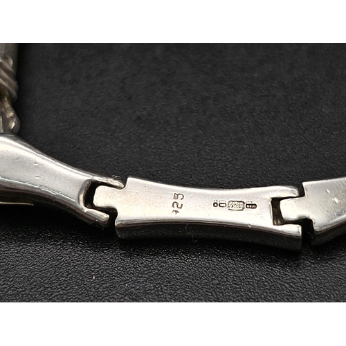 627 - AN ATTRACTIVE SILVER LINK NECKLACE .  47.2gms    42cms
