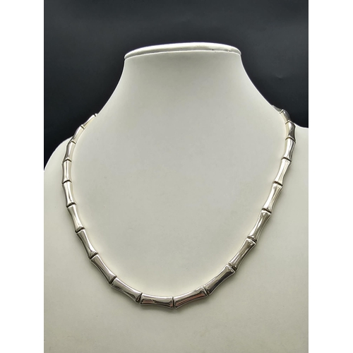 627 - AN ATTRACTIVE SILVER LINK NECKLACE .  47.2gms    42cms