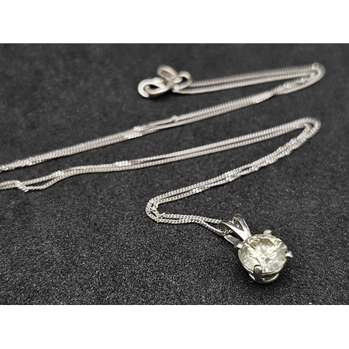 660 - .98ct DIAMOND PENDANT ON AN 18K  40cms GOLD CHAIN.   2.1gms