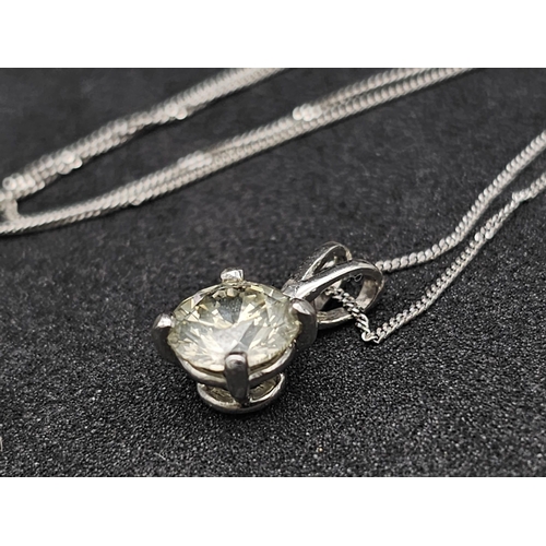 660 - .98ct DIAMOND PENDANT ON AN 18K  40cms GOLD CHAIN.   2.1gms