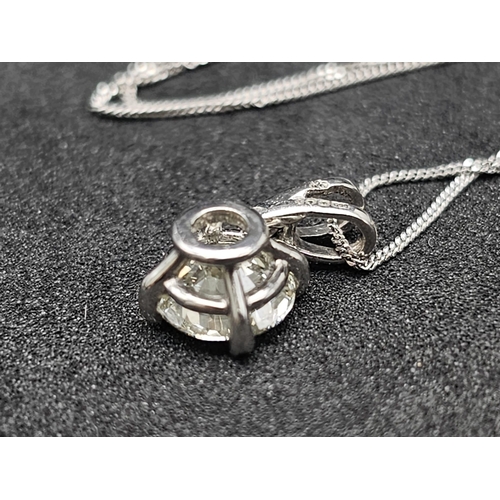 660 - .98ct DIAMOND PENDANT ON AN 18K  40cms GOLD CHAIN.   2.1gms
