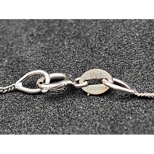 660 - .98ct DIAMOND PENDANT ON AN 18K  40cms GOLD CHAIN.   2.1gms