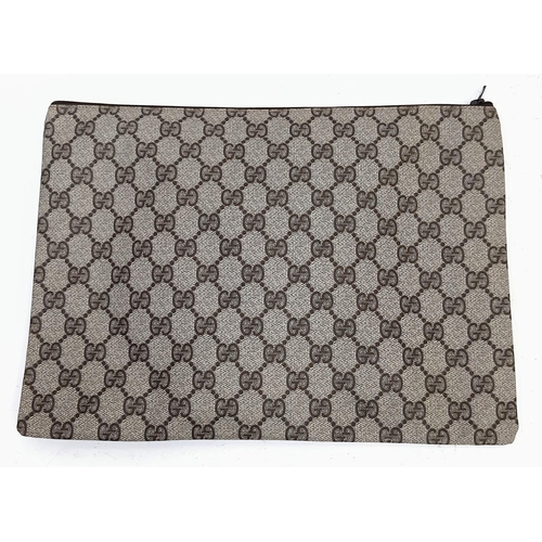 739 - A Gucci Monogram Canvas Pochette. 31cm x 24cm. Ref: 13022.