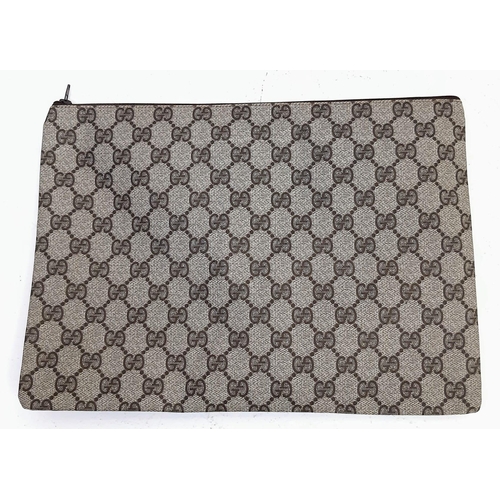 739 - A Gucci Monogram Canvas Pochette. 31cm x 24cm. Ref: 13022.