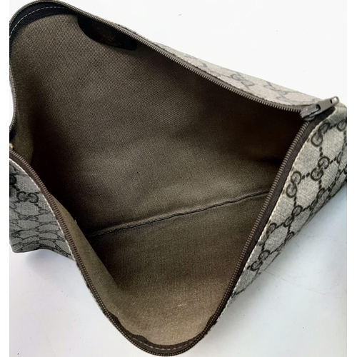739 - A Gucci Monogram Canvas Pochette. 31cm x 24cm. Ref: 13022.